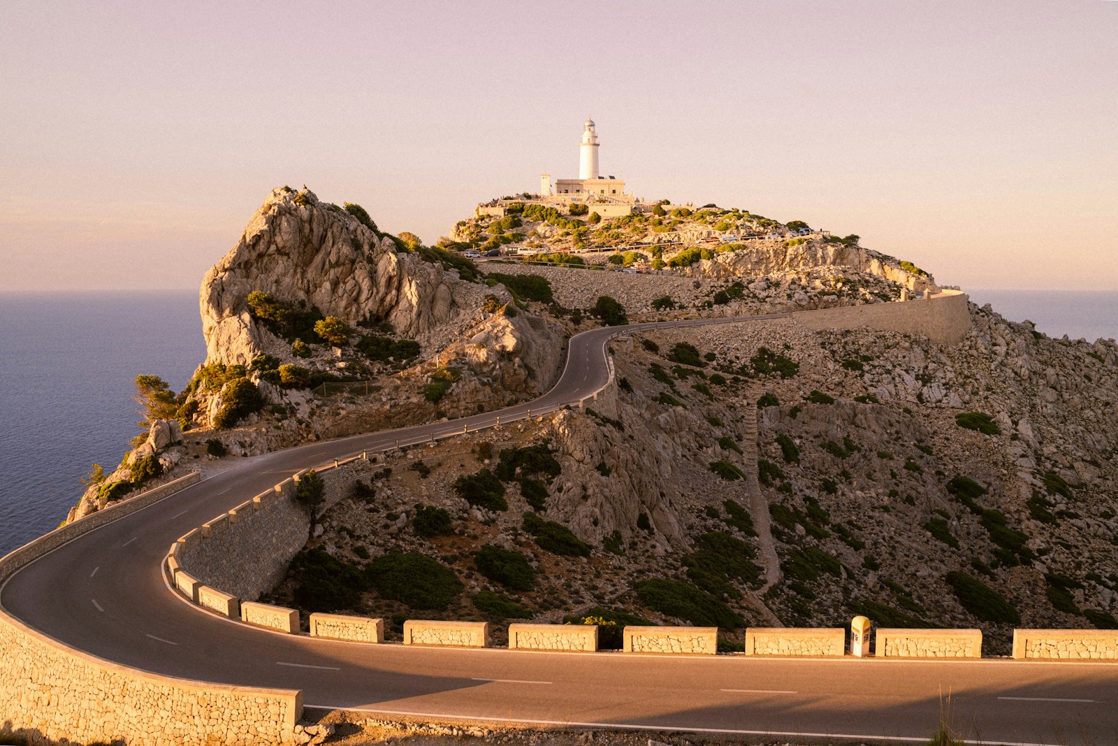 Mallorca & Canary Islands Bike Tours white and brown concrete building on top of mountain during daytime